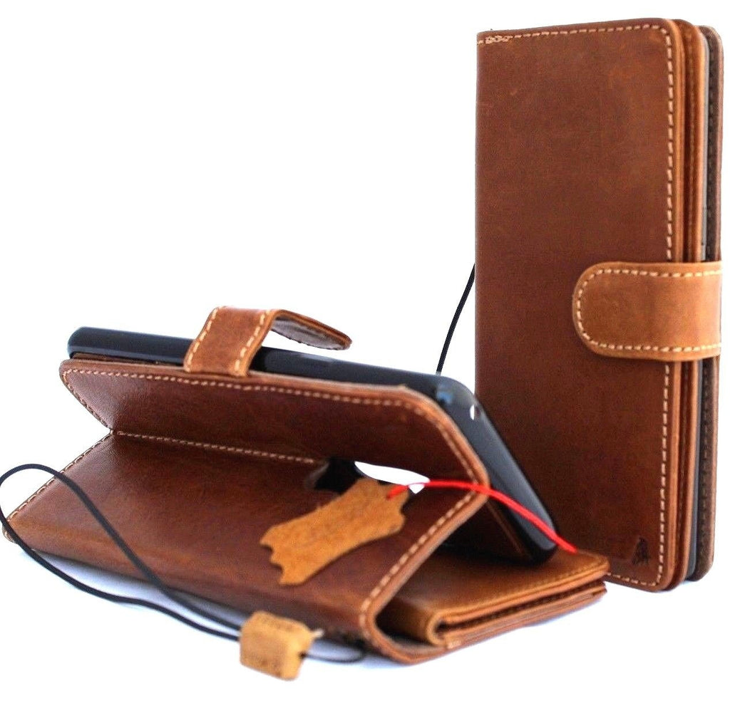 Genuine leather Google Pixel Fold wallet case by DAVISCASE in tan with book-style design and removable cover.