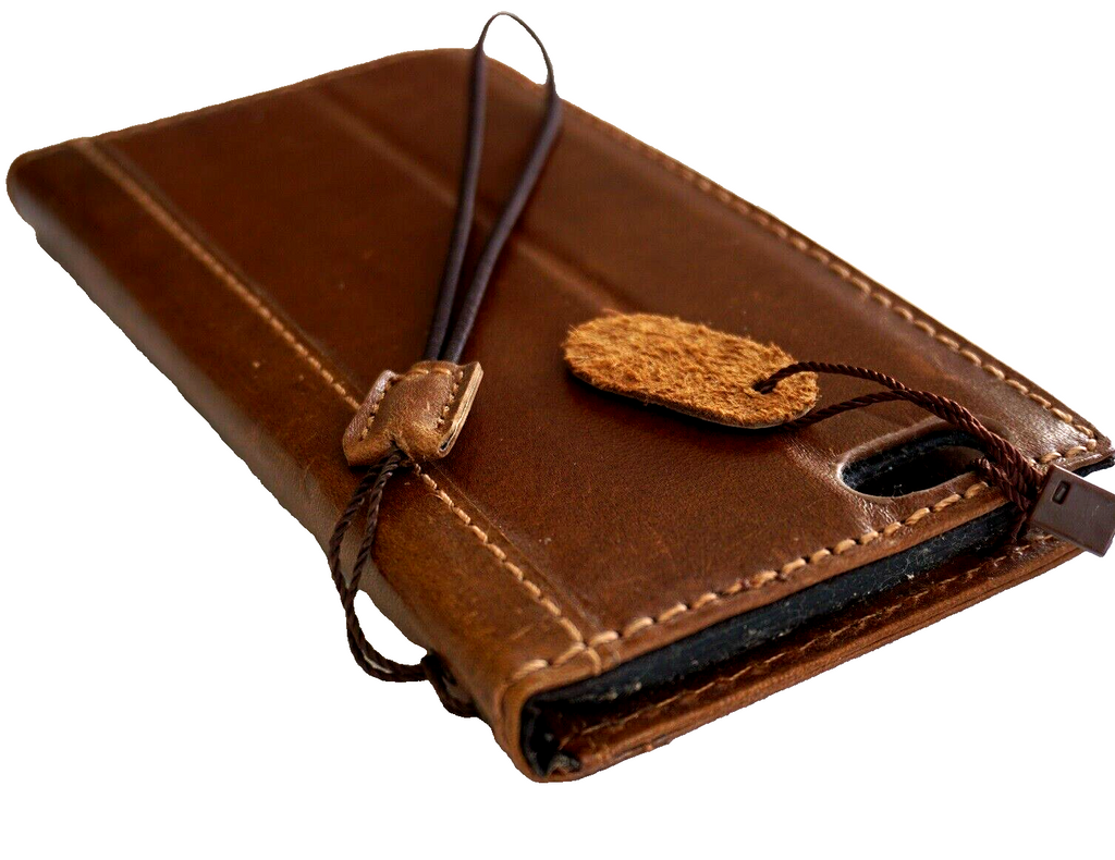 Handcrafted genuine leather phone case for iPhone 11 to 15 Pro Max by DAVISCASE, featuring vintage-style design and credit card slots.