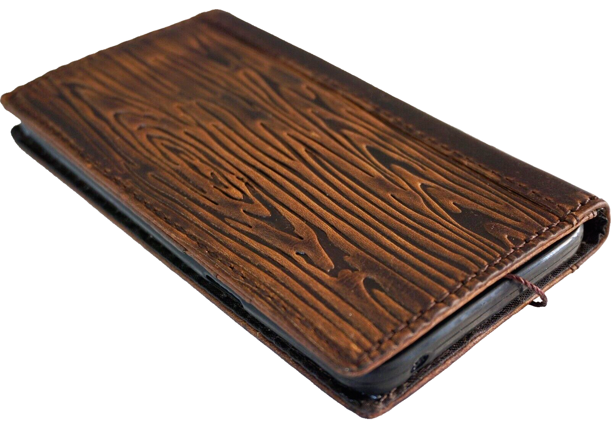 Handmade genuine leather phone case for iPhone models with shark wood style design, credit card slots, and wallet features.