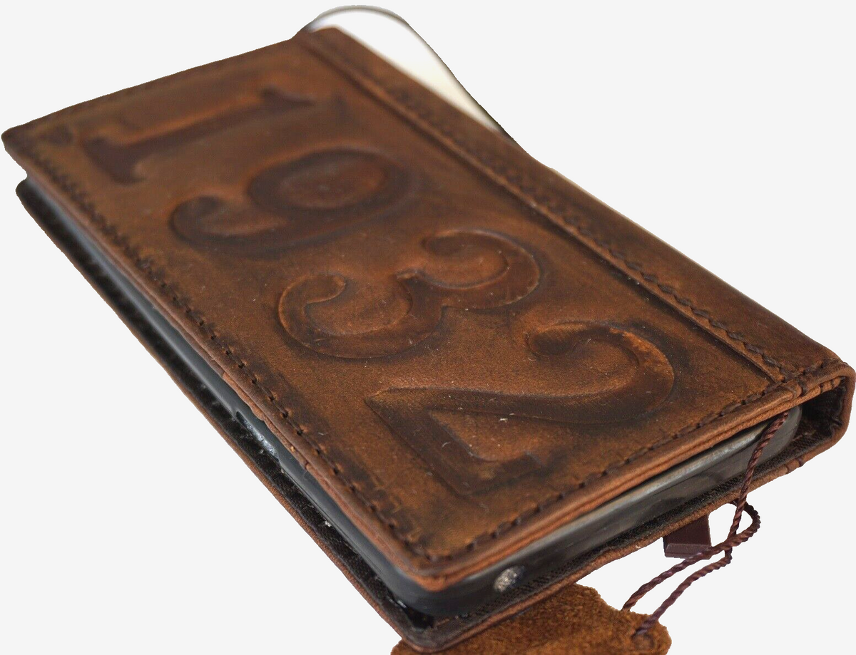 Handcrafted genuine leather phone case for iPhone 11-15 Pro Max, vintage dog paw design with credit card slots by DAVISCASE