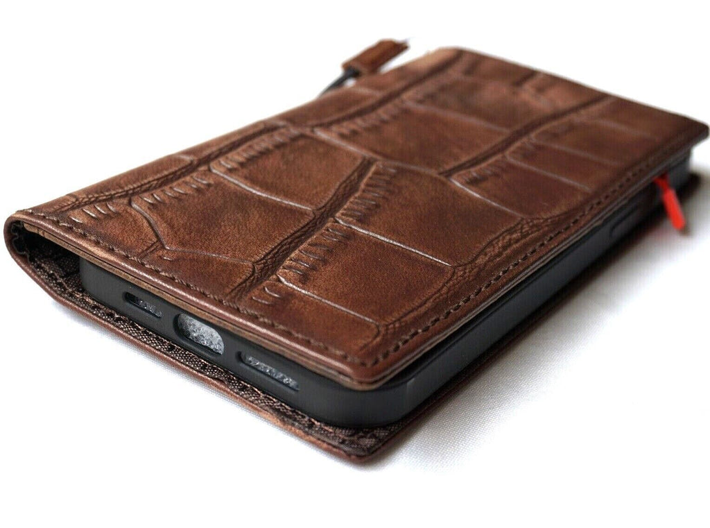 Handmade genuine leather phone case by DAVISCASE for iPhone models with crocodile style design, credit card slots, and vintage full grain finish.