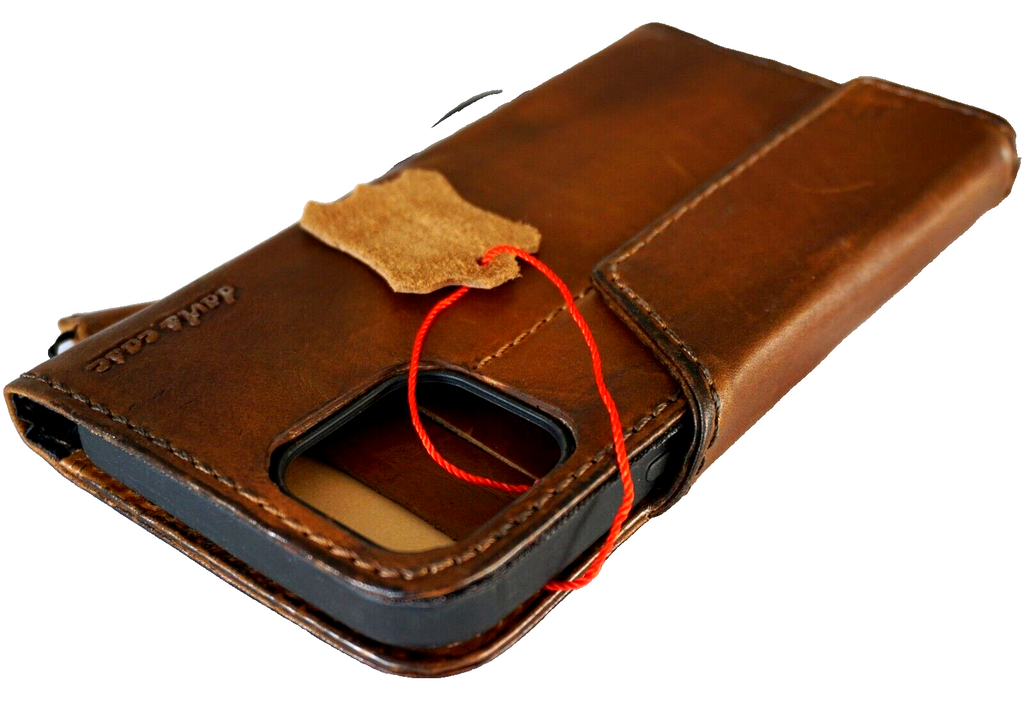 Handmade DAVISCASE genuine leather phone case for iPhone 11-16 Pro Max with vintage tree of life design and credit card slots.