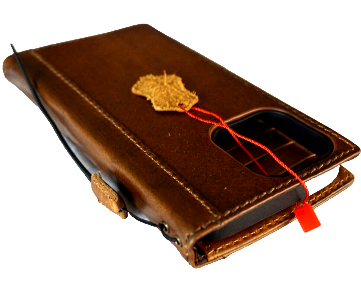 Handcrafted genuine leather phone case for iPhone and Samsung models, featuring Buddha and shark motifs, vintage style with card slots.