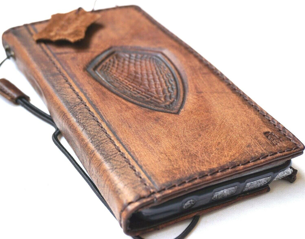 Handmade genuine leather phone case for iPhone 12 to 17 Pro Max, vintage-style wallet cover by DAVISCASE with DIY craft detail.