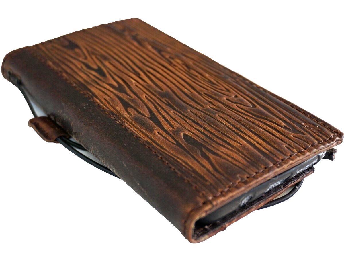 Handmade genuine leather phone case for Apple iPhone models with wood-style shark design, featuring wallet and credit card slots.