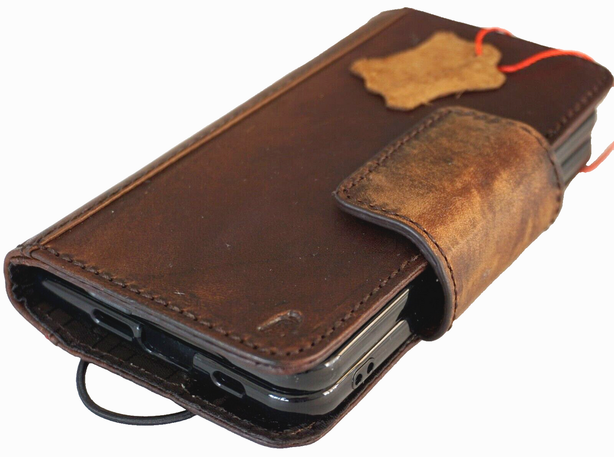 Genuine leather Google Pixel Fold case by DAVISCASE with wallet design, stand feature, and wireless charging compatibility.