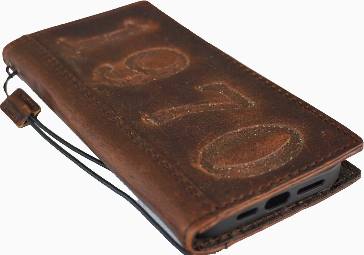 Handcrafted vintage leather wallet case for iPhone 11-15 Pro Max, featuring credit card slots and tiger stamping by DAVISCASE.
