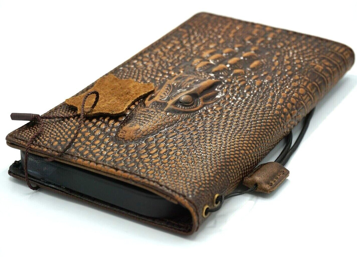 Handmade genuine leather phone case for iPhone models, featuring vintage crocodile style design and credit card slots.