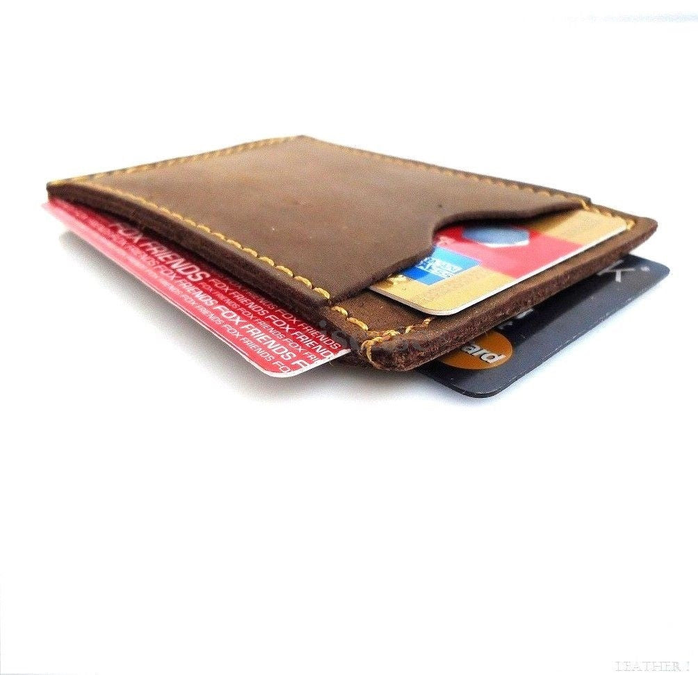 Genuine leather men's mini wallet with ID and credit card slots, compact and slim for easy pocket carry.