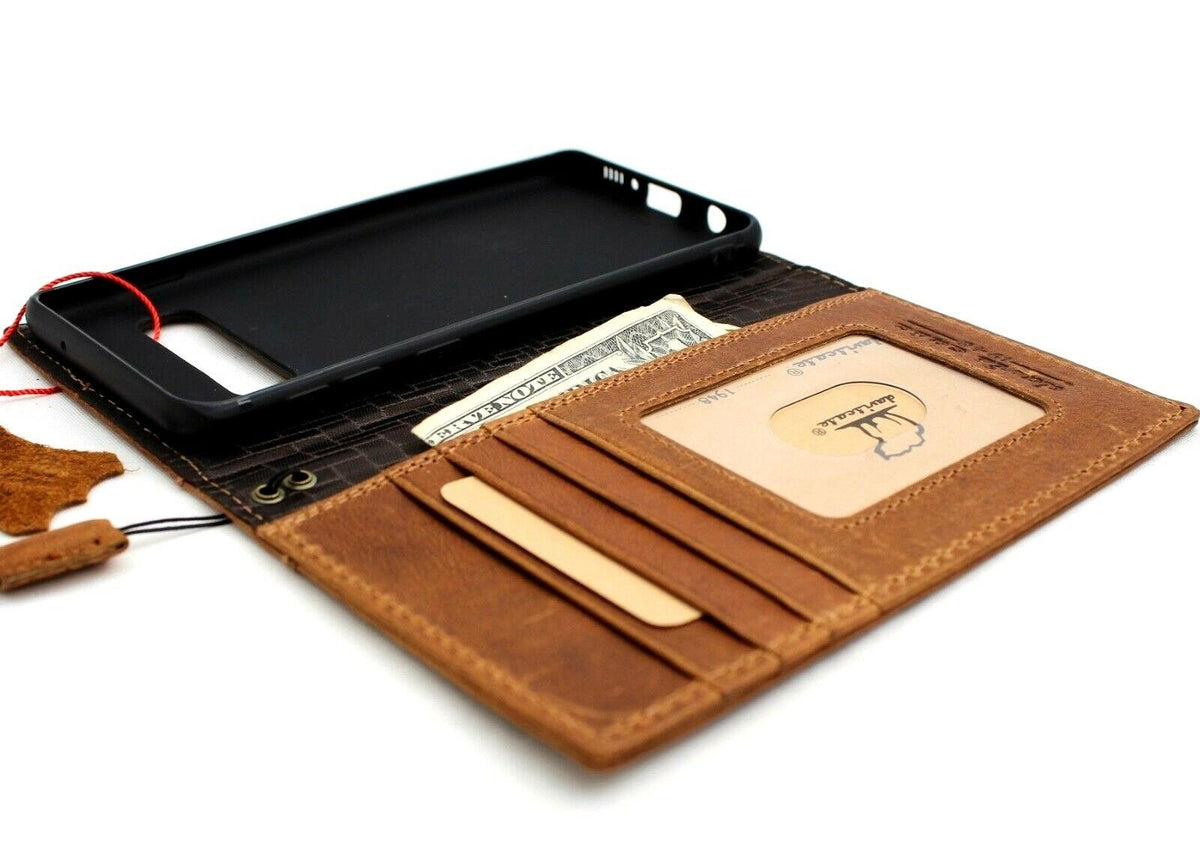 Tan genuine leather Samsung Galaxy S10e wallet case with card slots, strap, and slim design by DAVISCASE.