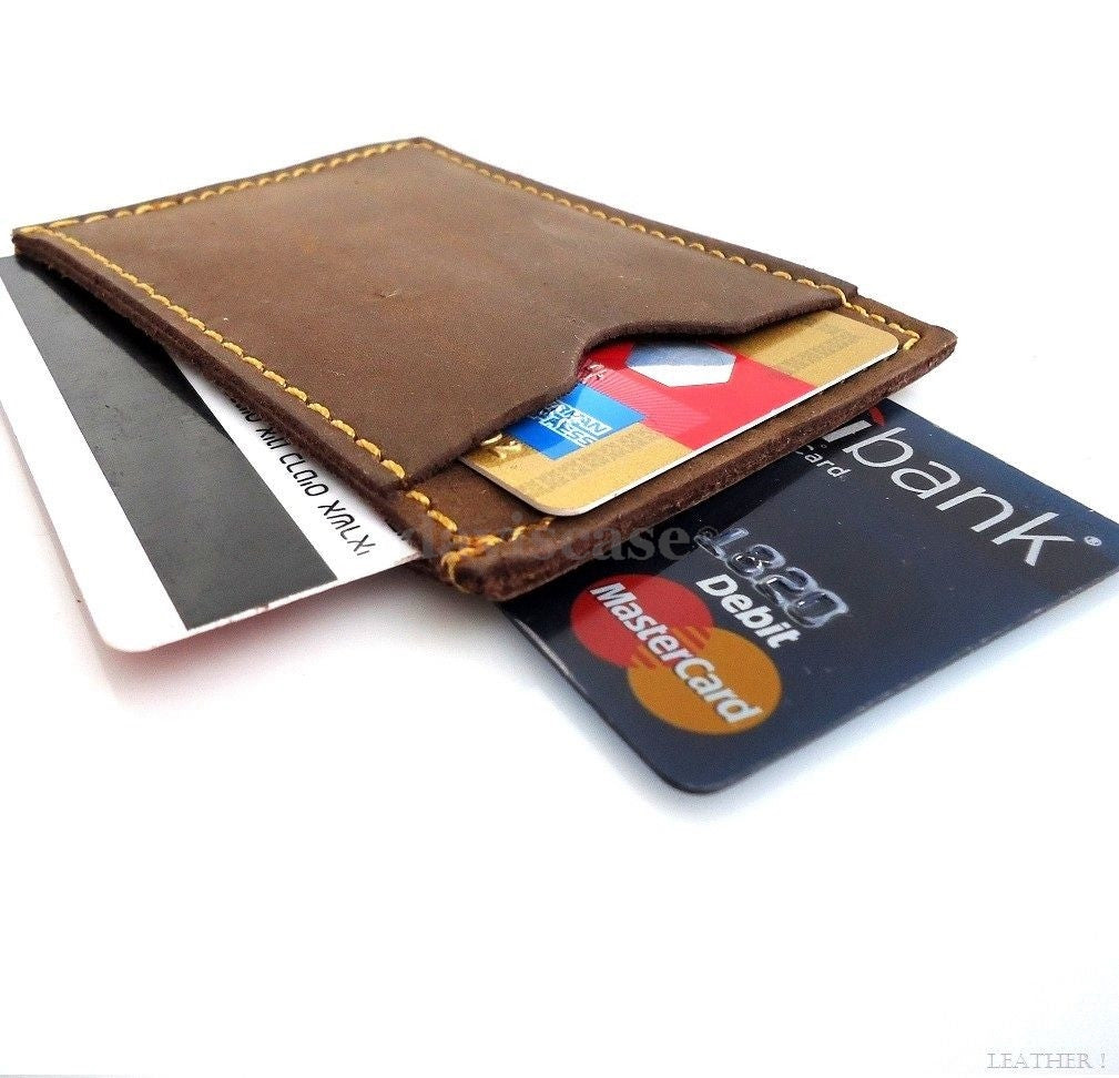 Genuine leather men's mini wallet with card slots and money pocket, compact and slim credit card holder for everyday use.