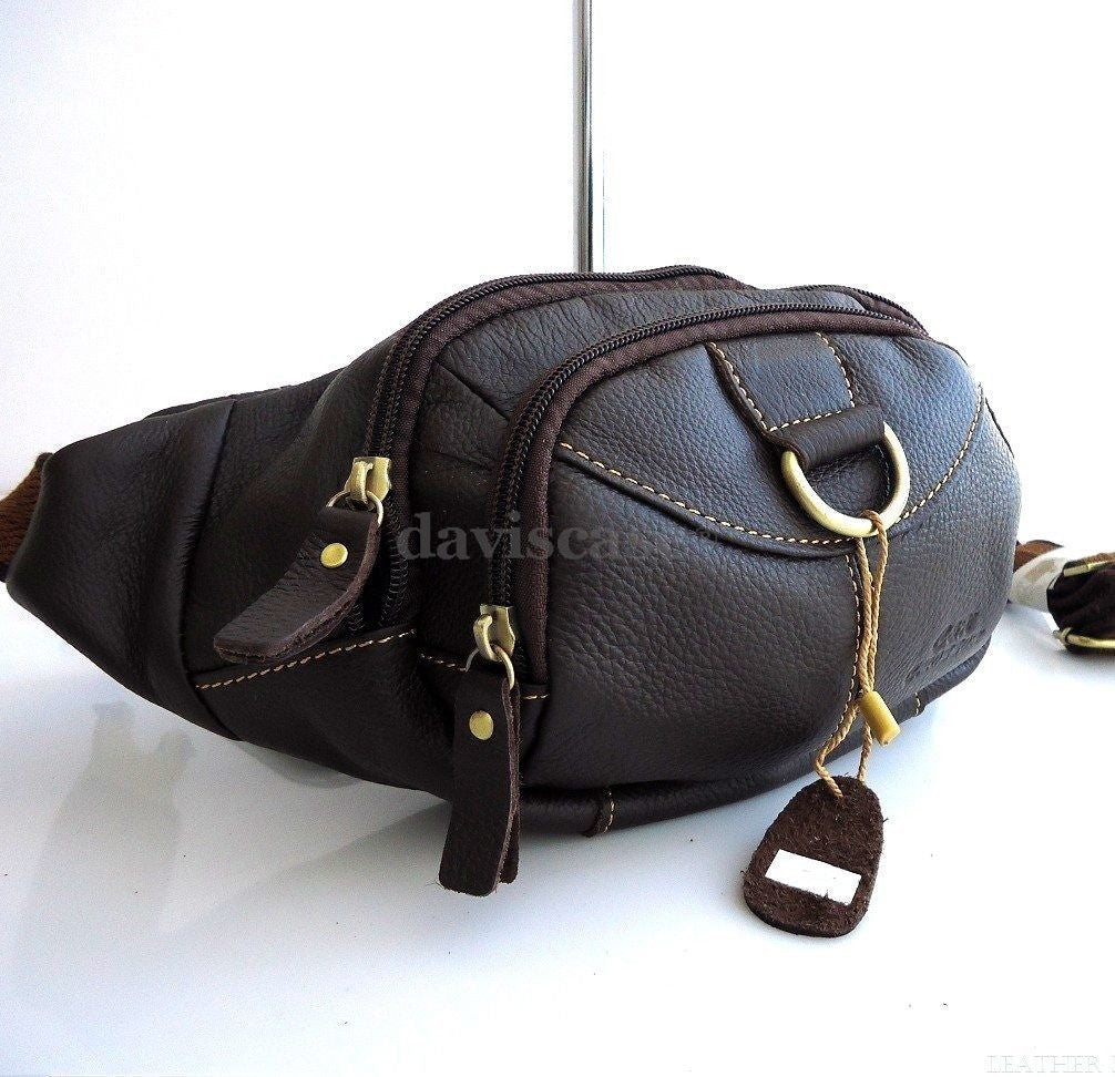 Men's genuine leather wallet bag with zipper, waist pouch, and sling backpack design, featuring a cellphone holder from vendor-unknown.