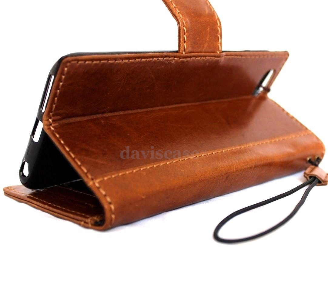 Handmade genuine leather iPhone 6 Plus case with wallet design, card slots, magnet closure, slim fit, and business style.