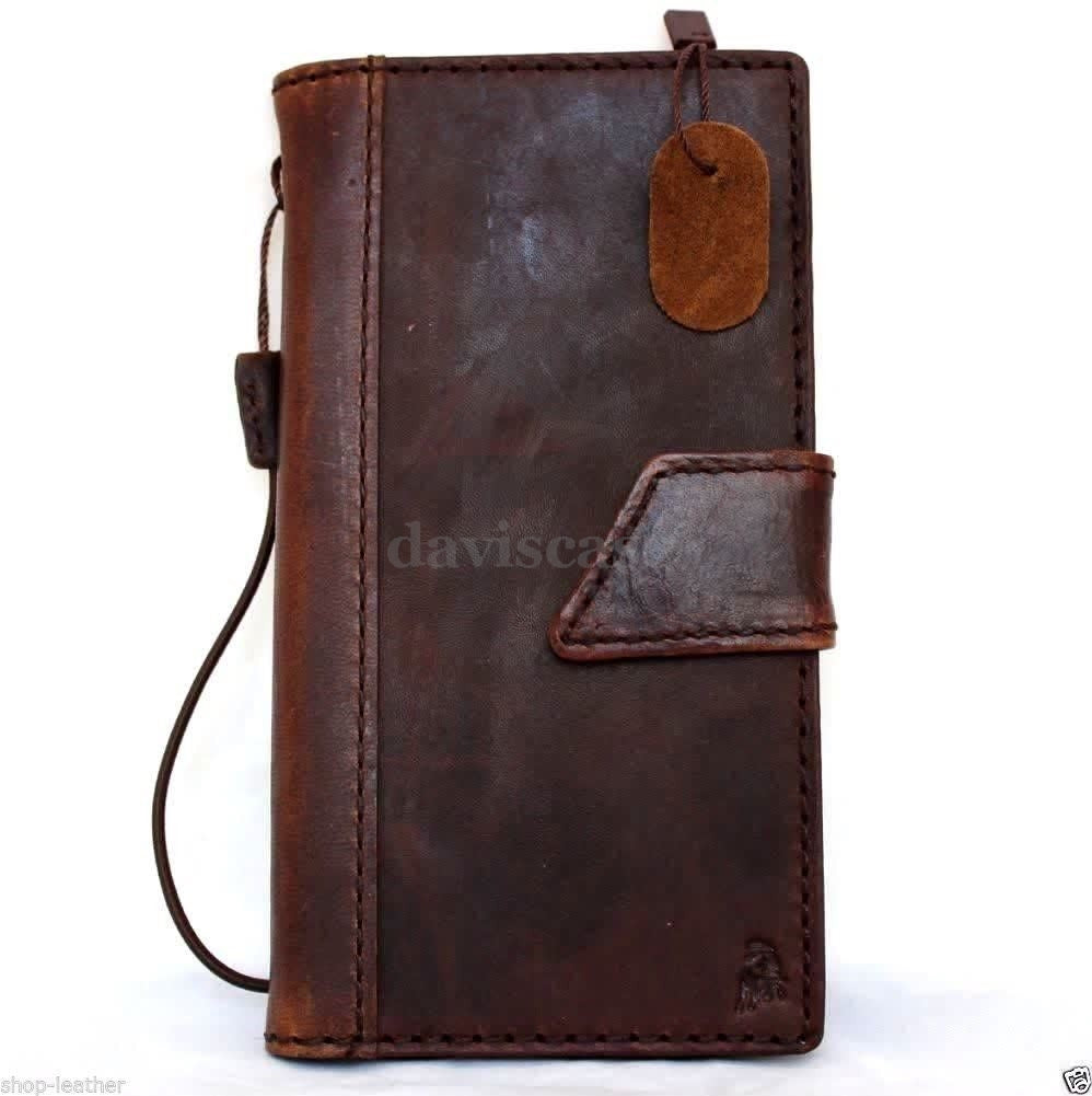 Handmade genuine Italian leather iPhone 6 case with flip wallet design, credit card slots, and magnetic closure.