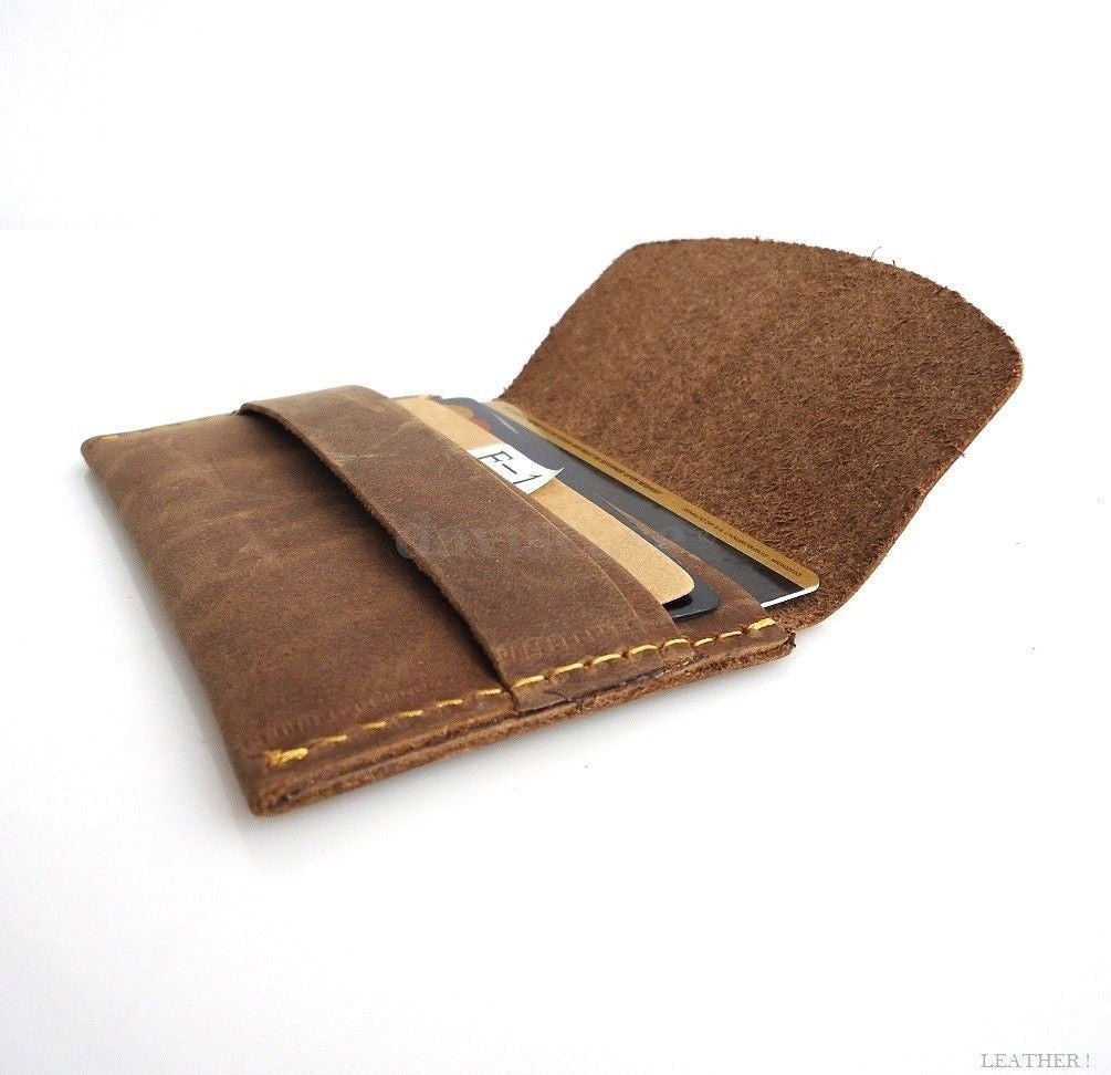 Genuine leather men's mini wallet by DAVISCASE with slim design, ID window, credit card slots, for money and essentials.