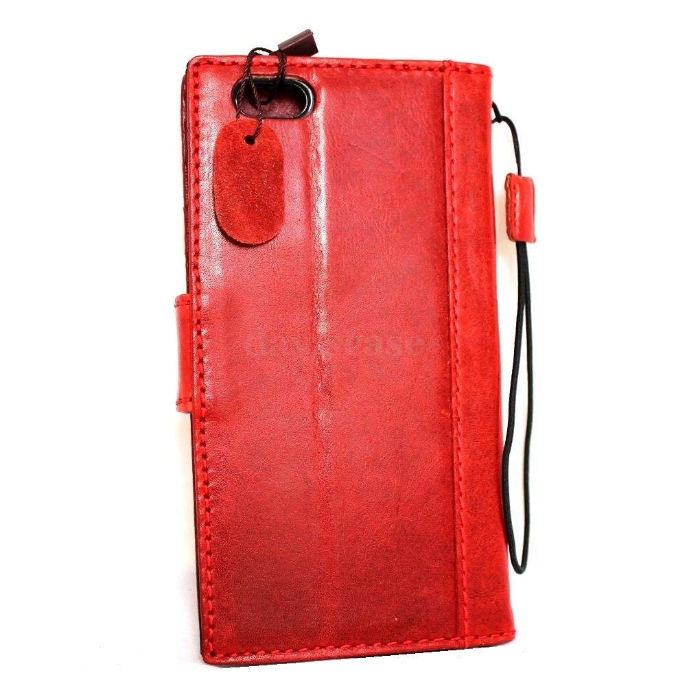 Handmade genuine Italian leather iPhone 6 Plus case with wallet design, flip cover, credit card slots, and magnetic closure.