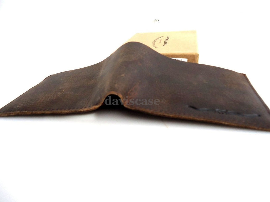 Men's full leather brown wallet with credit card slots, ID window, and bill compartments, slim design for everyday use.