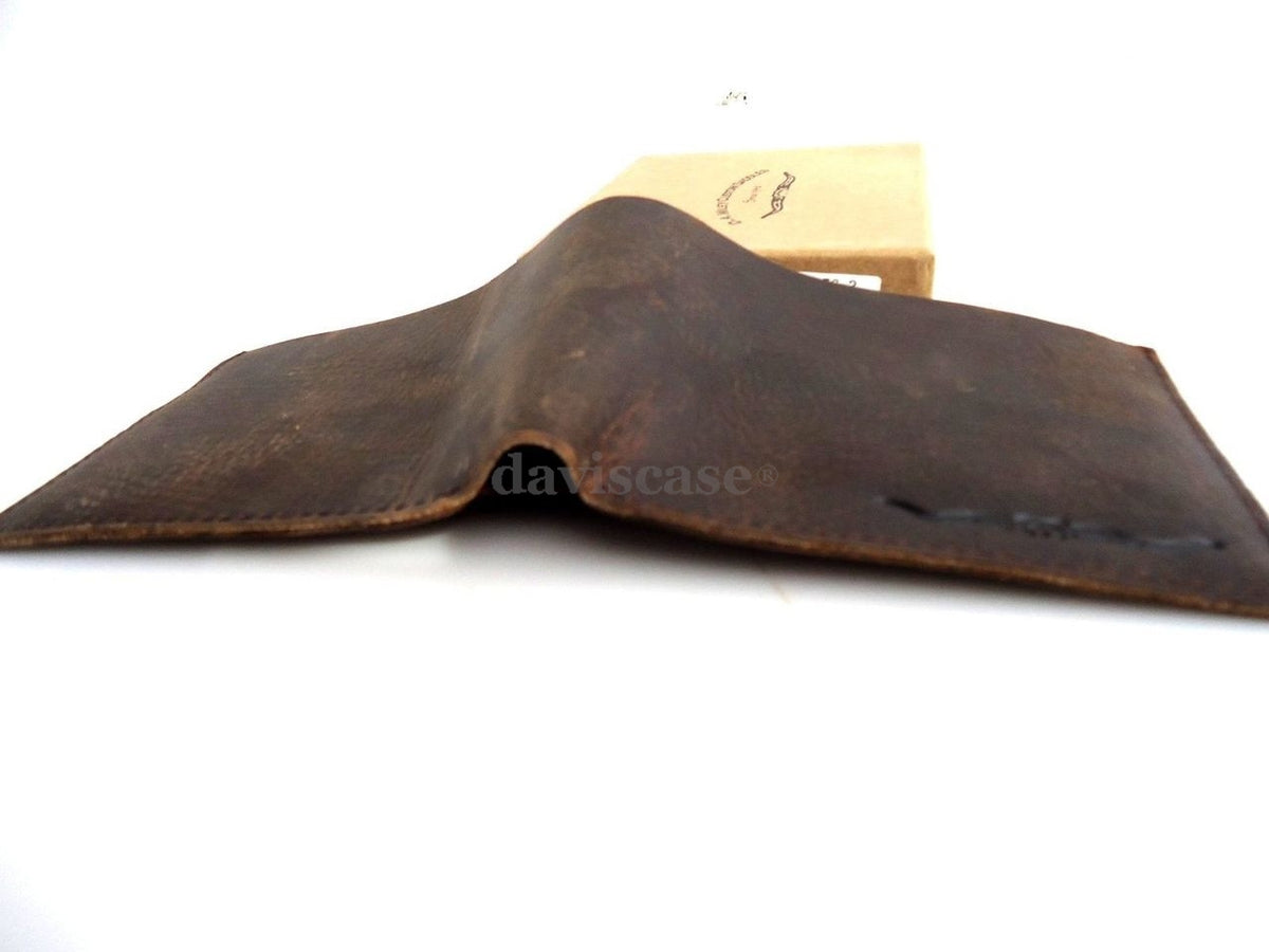Men's full leather brown wallet with credit card slots, ID window, and bill compartments, slim design for everyday use.