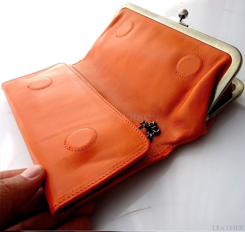 Orange genuine leather women's wallet with card slots, coin pocket, and clutch design by DAVISCASE.