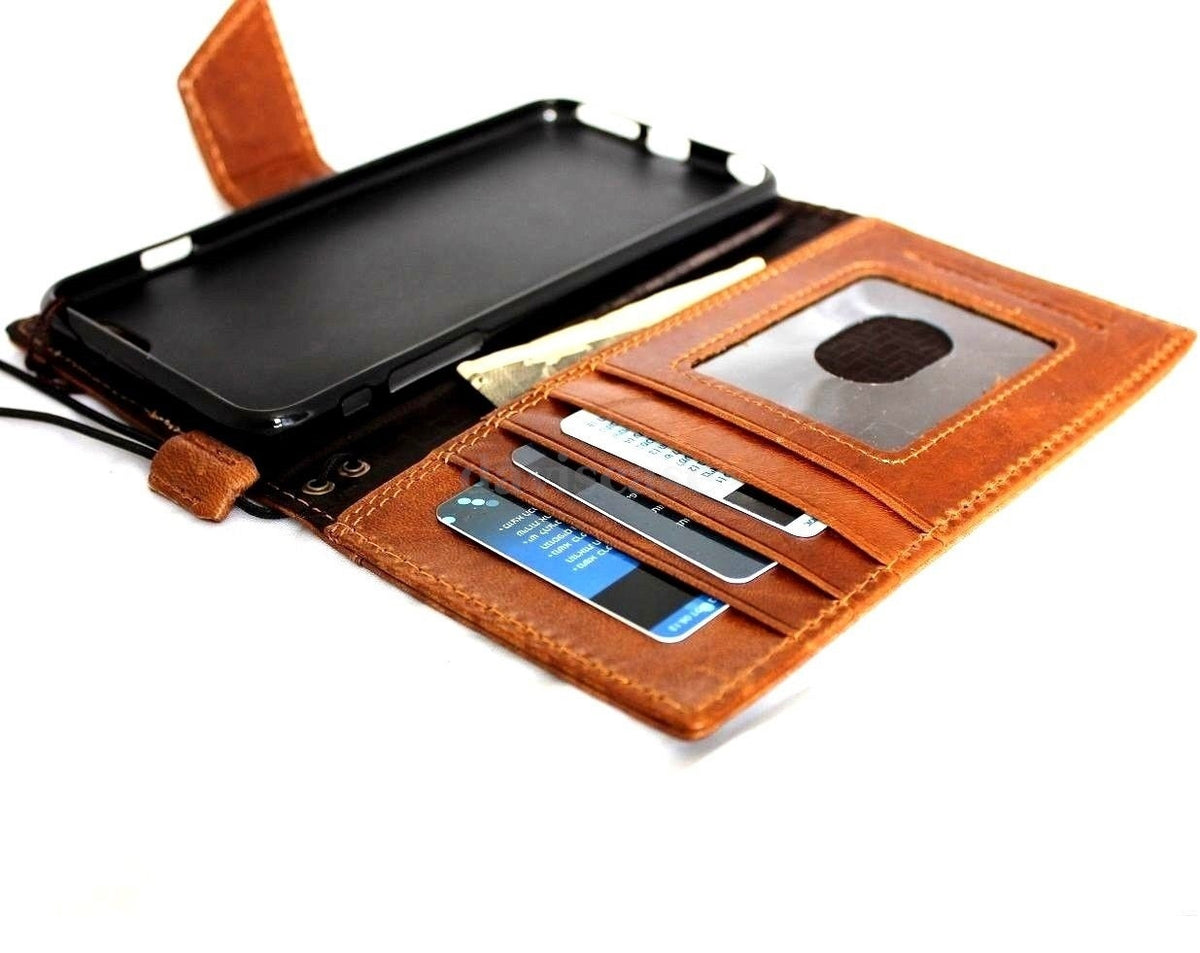 Handmade genuine leather iPhone 6 Plus case with wallet design, credit card slots, ID window, and magnetic closure.