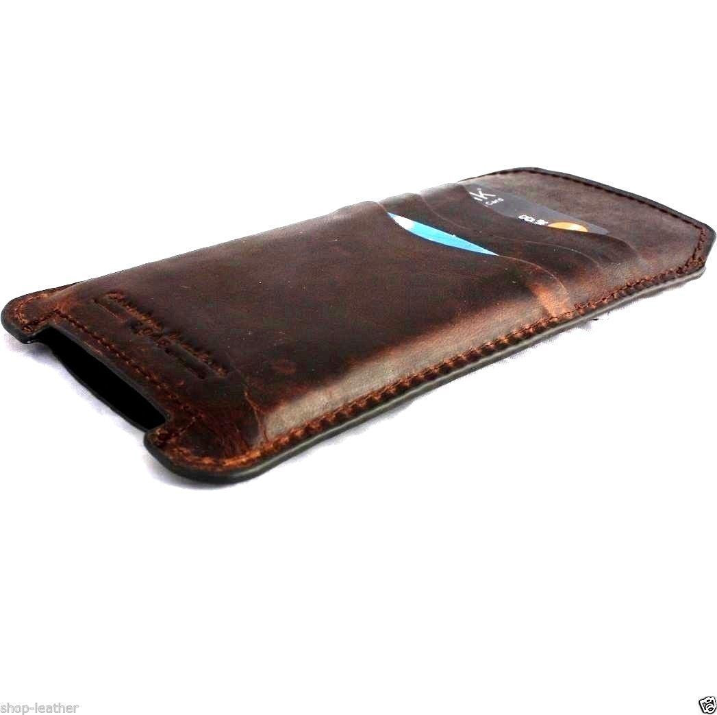 Genuine handmade leather case for iPhone 8 Plus by Davis Case, featuring a slim Bible book wallet design with credit card slots.