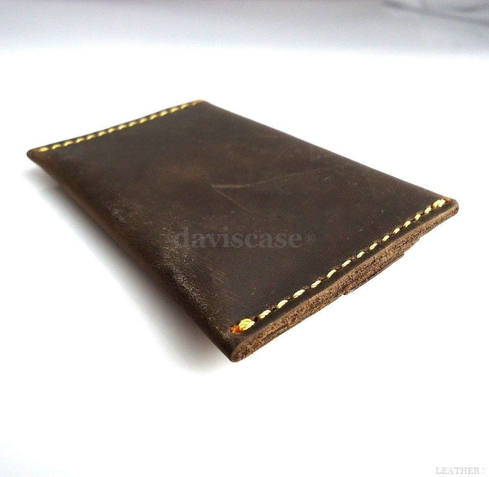 Genuine full leather men's mini wallet by DAVISCASE, featuring cash and card slots in a sleek, compact design.