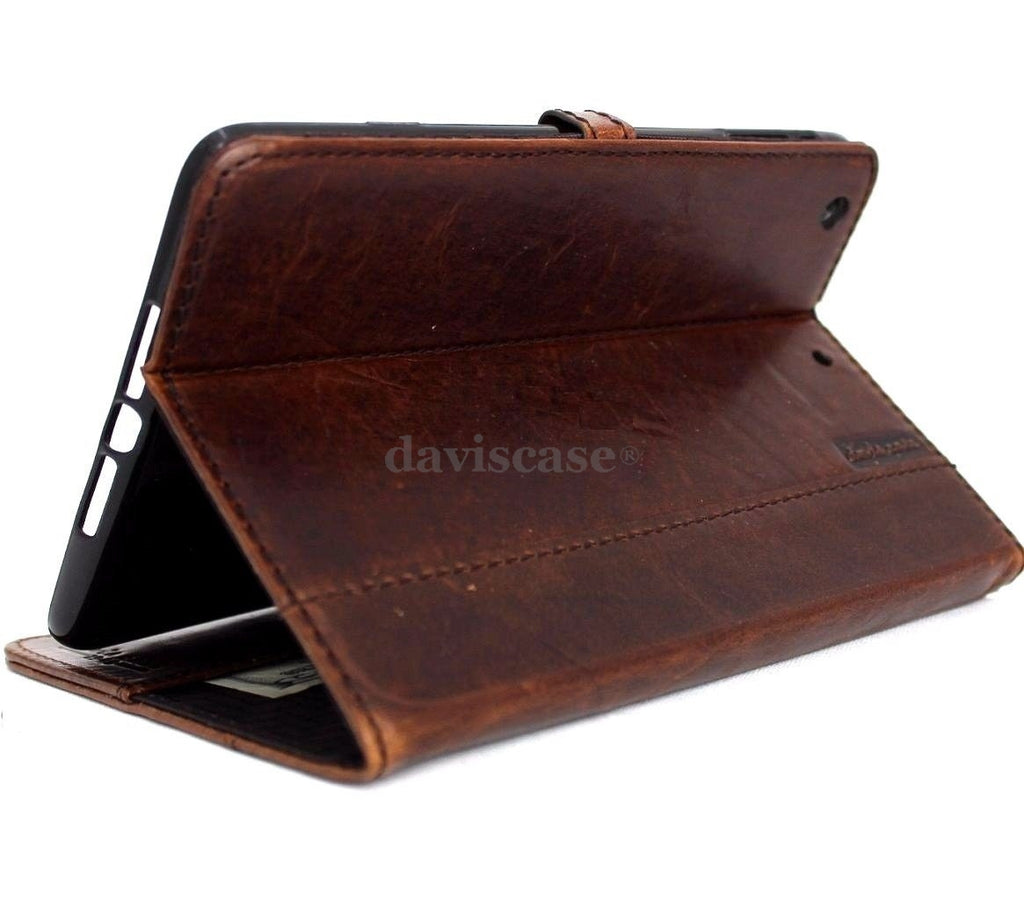 Brown genuine leather iPad mini 4 case with card slots, stand feature, slim design, and magnetic closure.