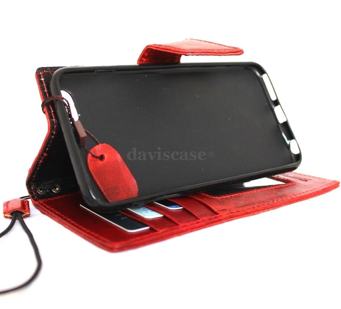 Handmade genuine Italian leather case for iPhone 6 Plus with wallet-style flip cover, credit card slots, and magnetic closure.