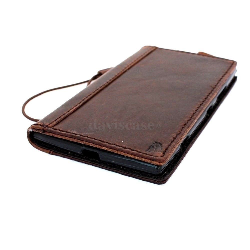 Genuine Italy leather iPhone 6 Plus wallet case with flip cover, card slots, and slim design in black, handcrafted for protection.