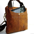 Men's genuine soft leather messenger bag in tan with vintage design by DAVISCASE, featuring a classic style and practical hand strap.