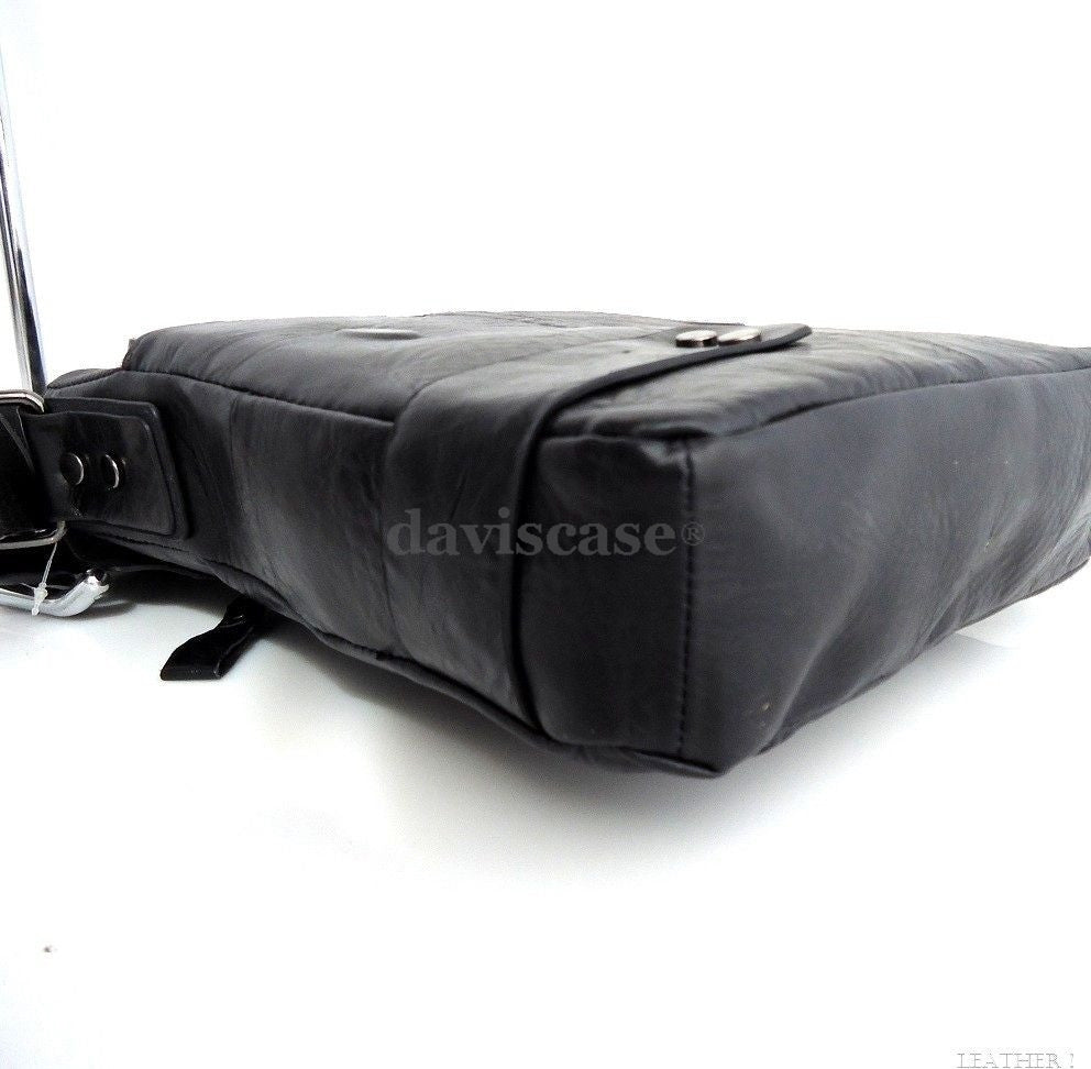 Black men's messenger bag made of PU leather, designed for laptops, with a professional business style and tote features.