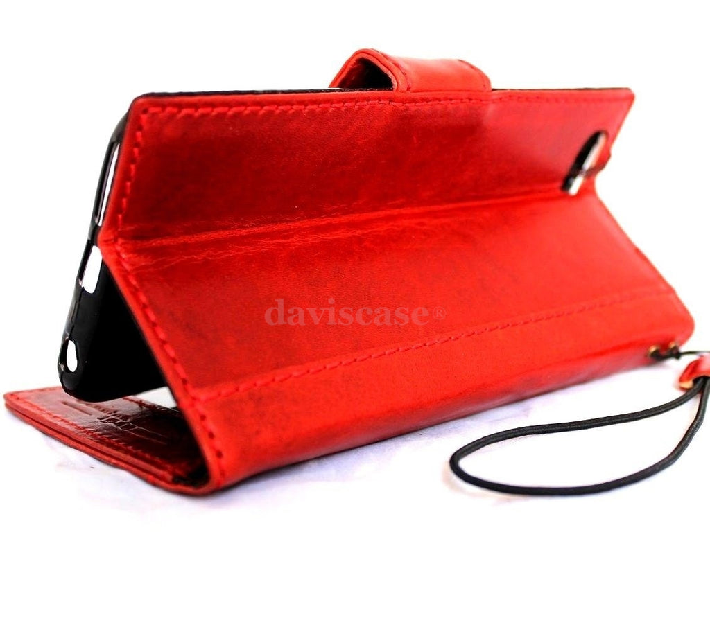 Handmade genuine Italian leather iPhone 6 Plus case with wallet, card slots, magnetic closure, slim flip design.