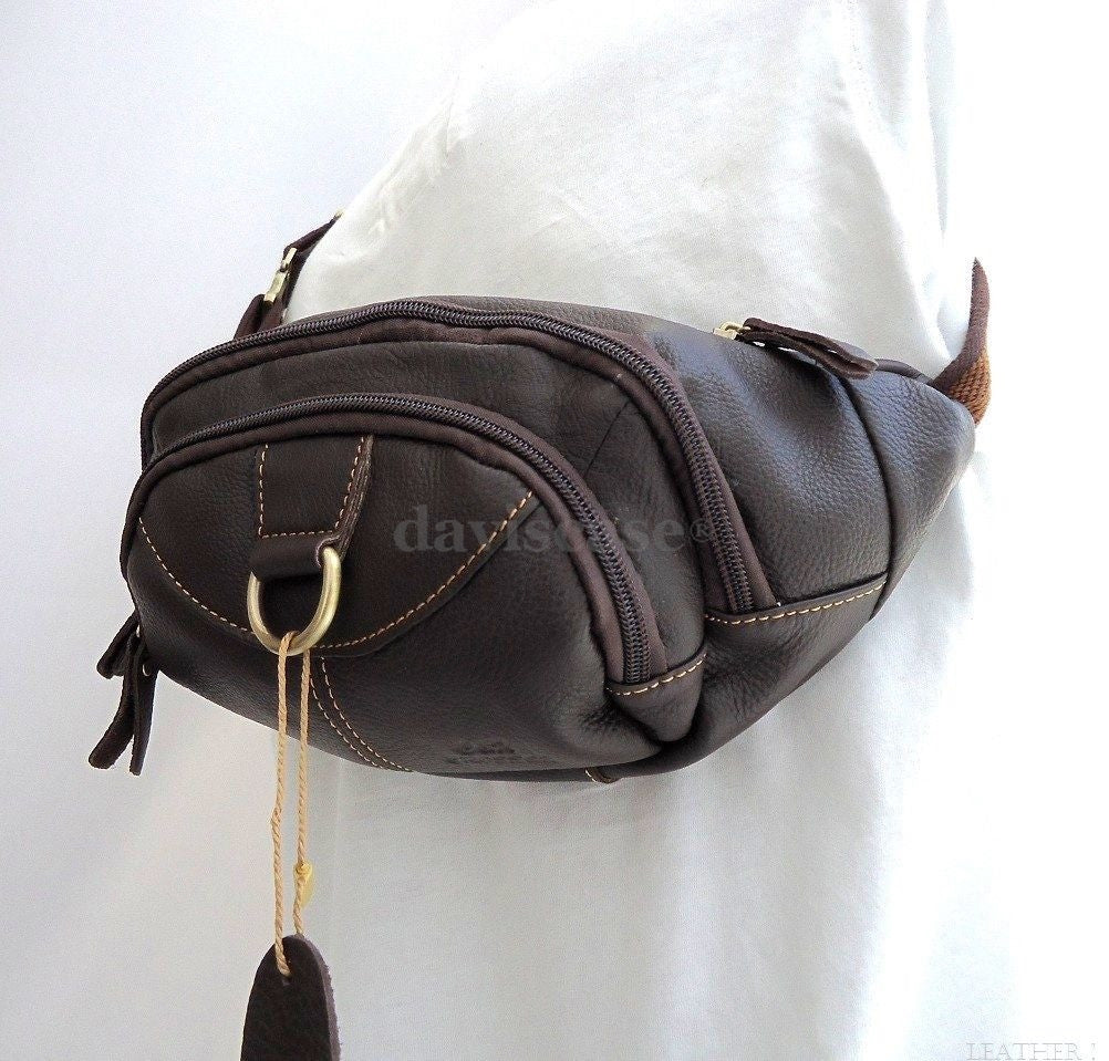Men's leather waist pouch with zipper, sling backpack style, featuring a cellphone pocket and versatile design for everyday use.