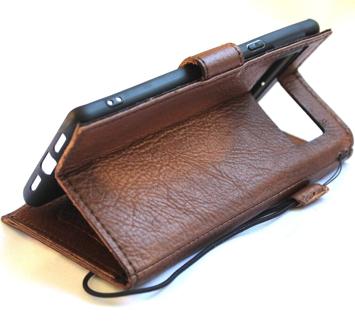 Genuine leather Google Pixel 7 Pro case by DAVISCASE with wallet, stand, zip closure, and wireless charging compatibility in brown leather