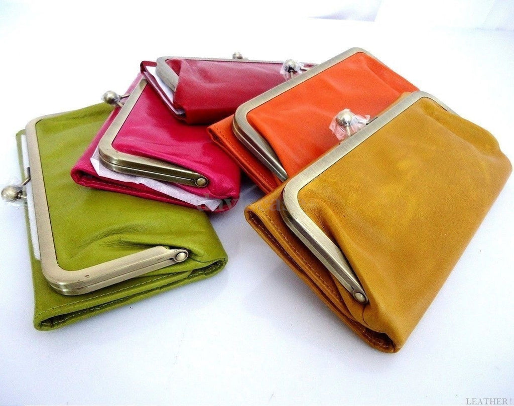 Pink genuine leather women's wallet with card slots, coin pocket, and clutch design by DAVISCASE, featuring a stylish skin texture.