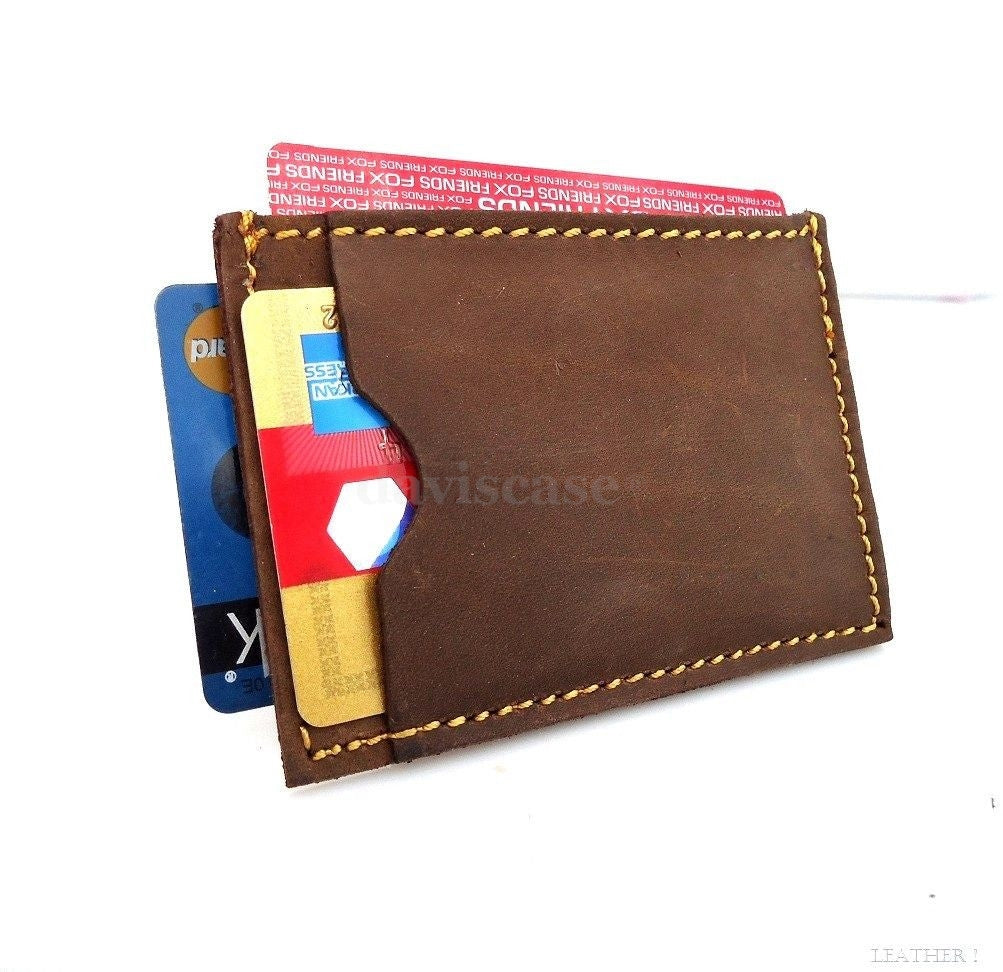 Genuine leather men's mini wallet with ID, credit card slots, compact design, and secure pocket for cash and cards.