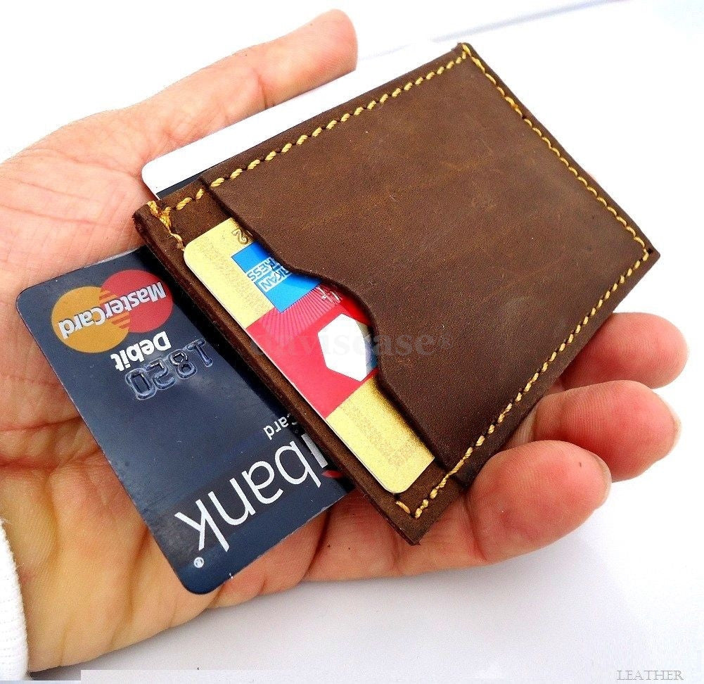 Genuine leather men's mini wallet with ID and credit card slots, compact and slim design for easy pocket storage.
