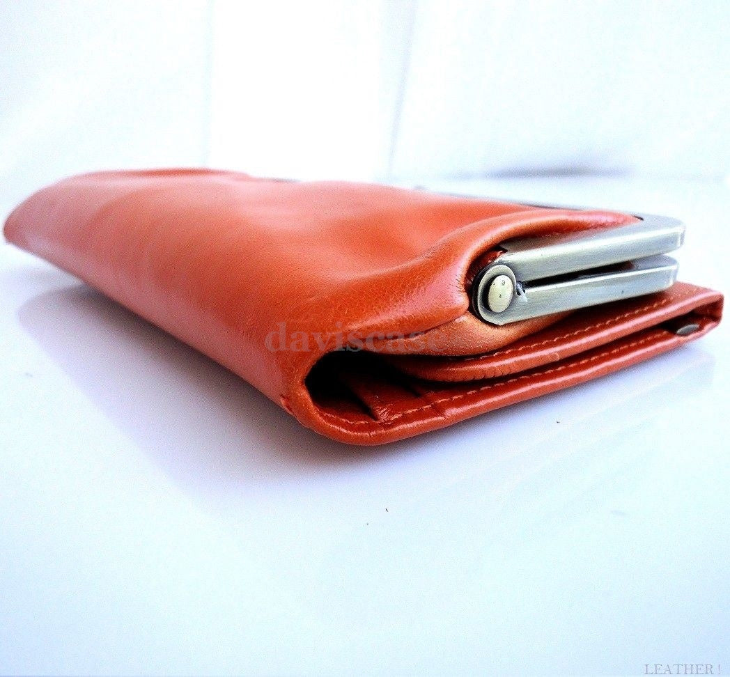 Orange genuine leather women's wallet with card slots, coin pocket, and clutch design by DAVISCASE.