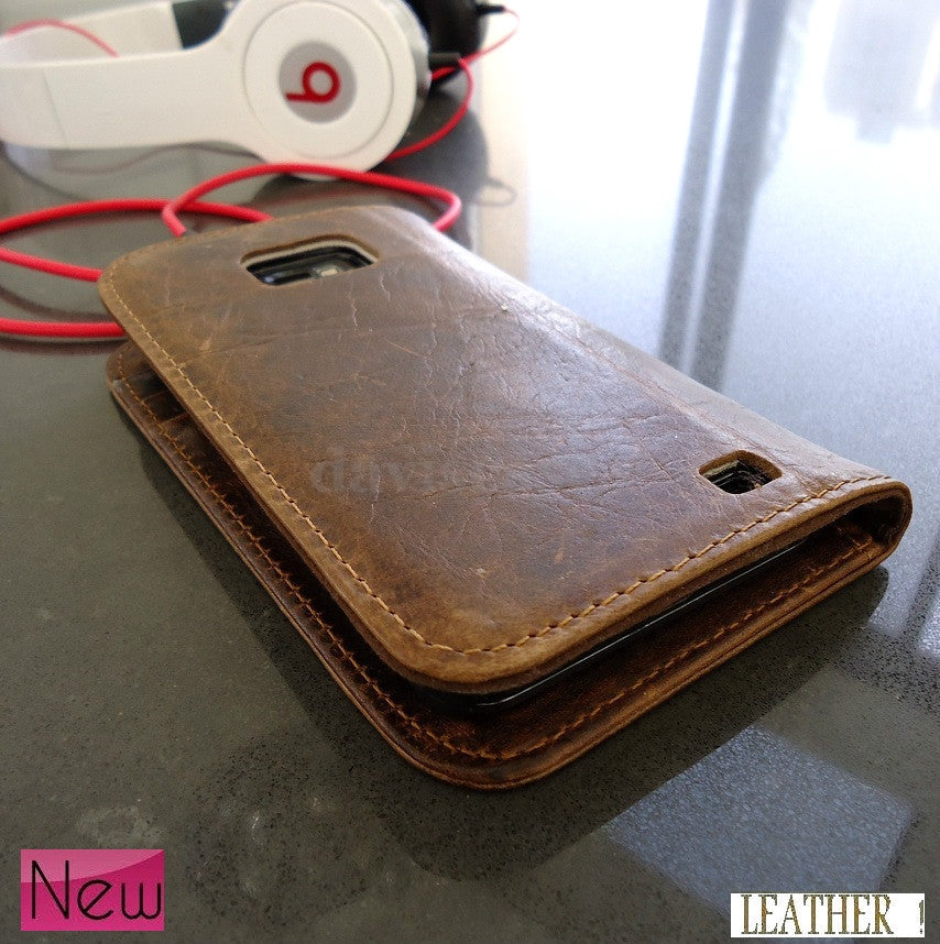 Handmade genuine leather Samsung Galaxy S2 phone case with card pocket, designed for a snug fit and stylish protection.