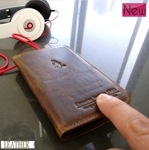 Handmade genuine leather phone case for Samsung Galaxy S2 with card pocket, designed to fit snugly and protect the device.