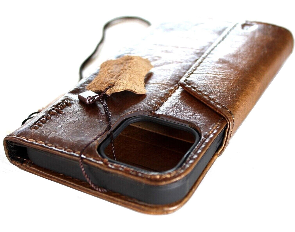 Handmade DAVISCASE leather phone case with vintage dog paw embossing for iPhone and Galaxy models, featuring a wallet-style design.