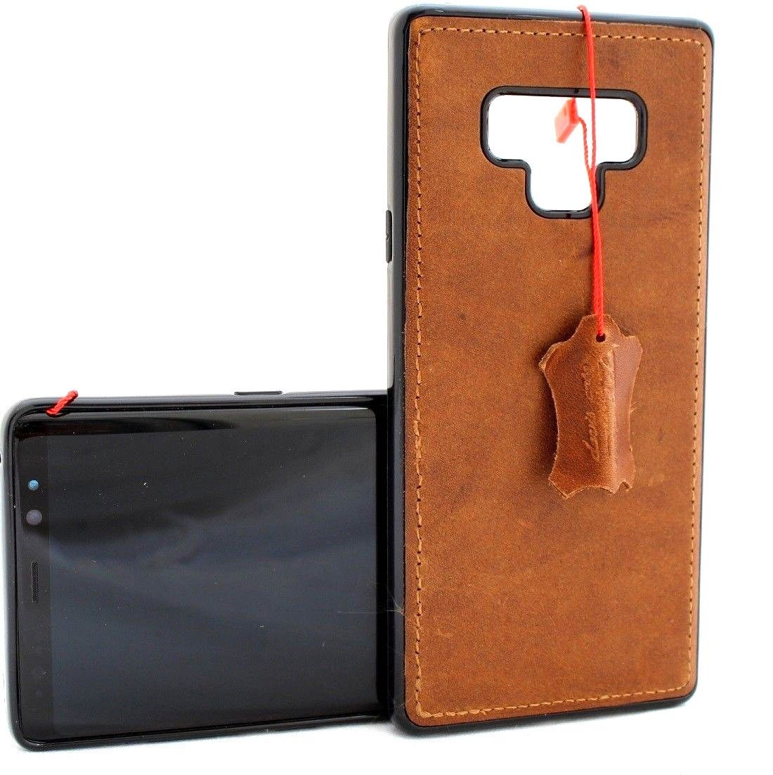 Handmade genuine leather Samsung Galaxy Note 9 book cover with soft magnetic closure and slim rubber car holder attachment.
