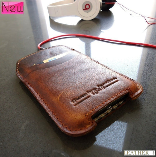 Handmade genuine leather Samsung Galaxy Ace 2 phone case with pull-fit design, featuring natural leather texture and precise cutouts.