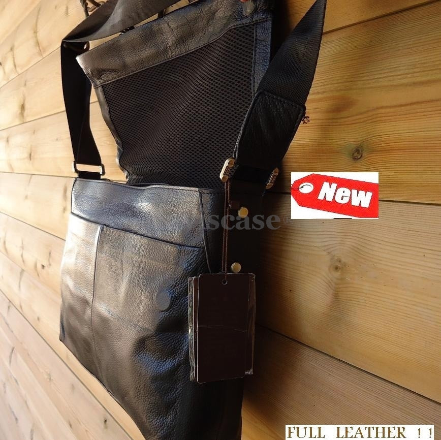 Vintage genuine leather men's laptop tote bag with travel design, featuring a spacious interior for 12 to 14-inch laptops.