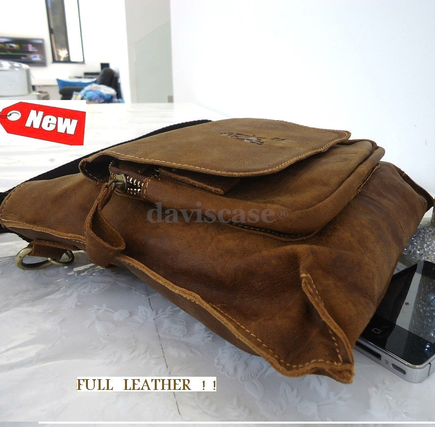 Men's genuine leather messenger bag with retro design, featuring a notebook compartment and adjustable strap, by vendor-unknown.