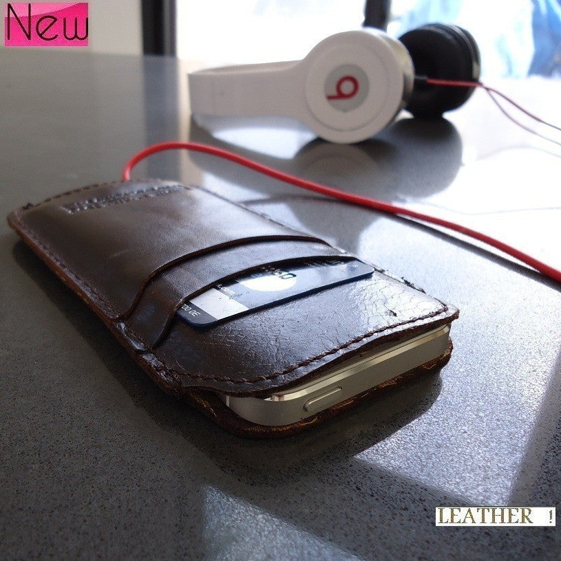 Handmade genuine leather iPhone 5 case with retro style purse design, featuring a pull tab for easy access, crafted by vendor-unknown.