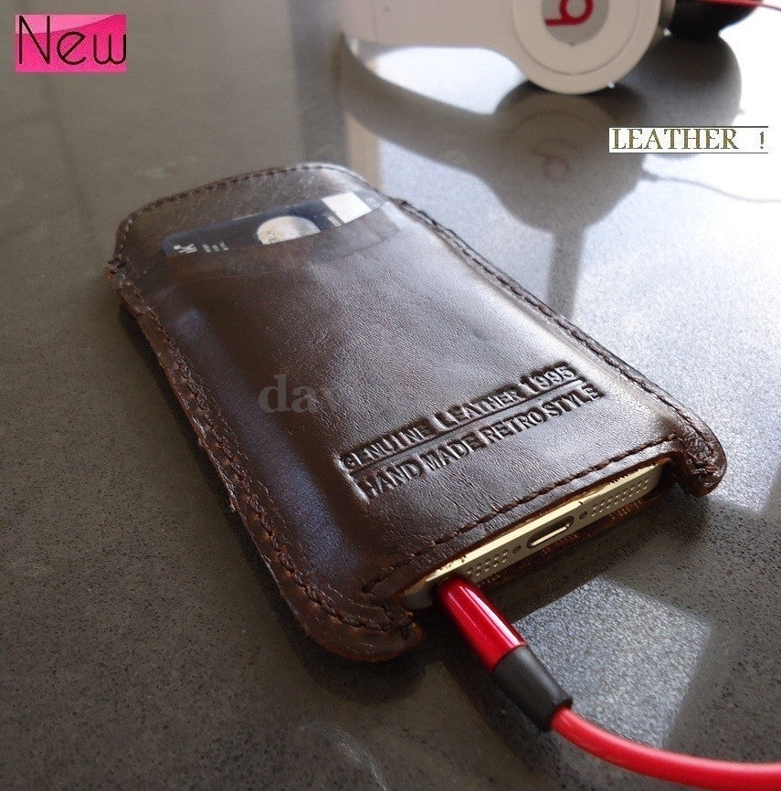 Handmade genuine leather case for iPhone 5, vintage-style purse cover with pull tab, designed for iPhone 5 protection and style.