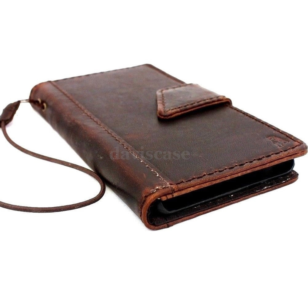 Genuine Italian leather iPhone 6 Plus case with flip cover, wallet slots, credit card holder, and magnetic clasp in a slim, luxurious design.