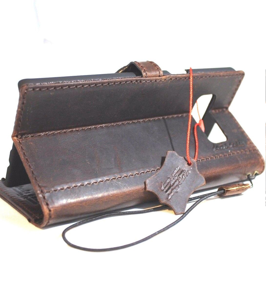 Dark brown genuine vintage leather Samsung Galaxy Note 8 book wallet case with magnetic closure, card slots, and stand feature.