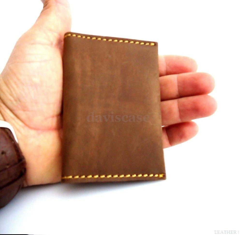 Men's natural soft leather credit card case with 4 slots, 2 slip pockets, bi-fold design, in classic tan from DAVISCASE.